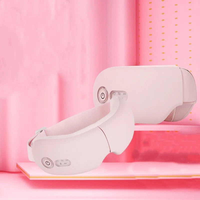 Bluetooth Music Smart Eye Protector with Hot Pack and Vibration Massage in white, pink, and black
