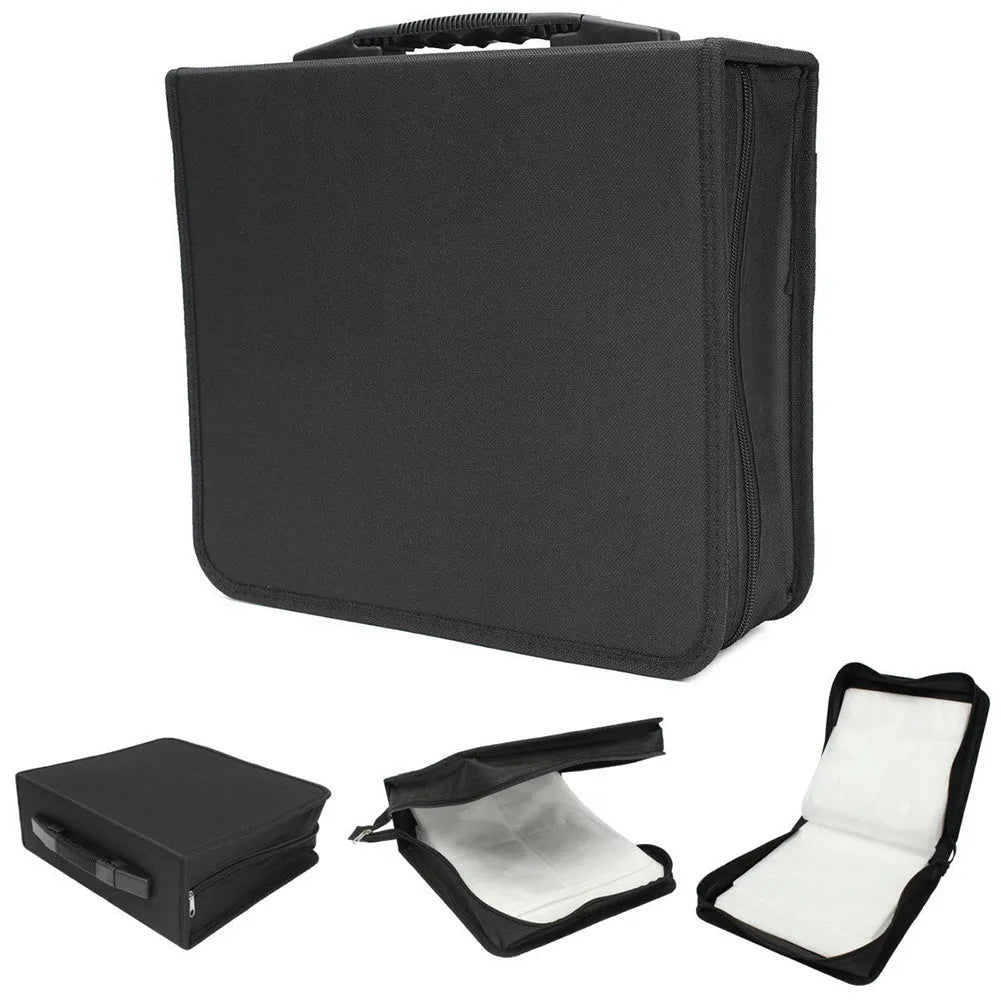 Black Oxford fabric CD storage binder with a zipper and top hand strap, open to show disc sleeves.
