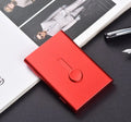 Hand push aluminium business card case in silver shown open with cards and internal layers visible