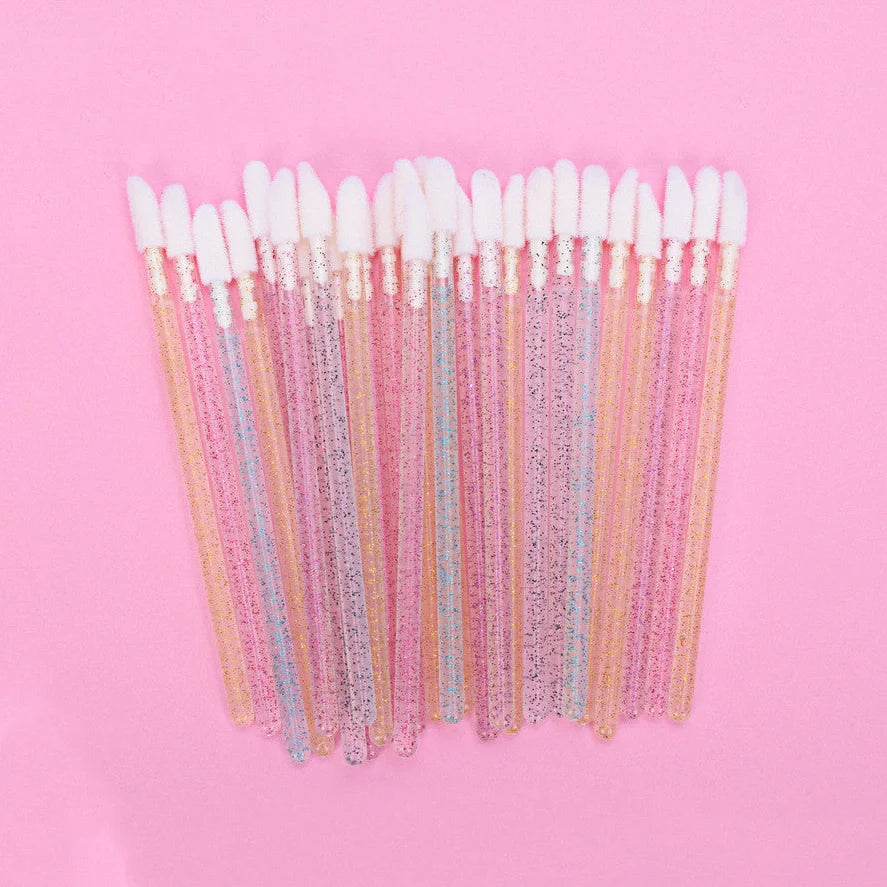 Crystal rod lip brush with synthetic fibre bristles in six colour options on white background
