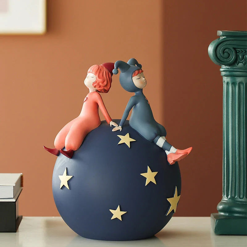 Hand-painted resin elf girl sculpture ornament with vibrant orange detailing