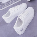 Women's PU leather heart pattern flat shoes in white red colour with non-slip rubber sole