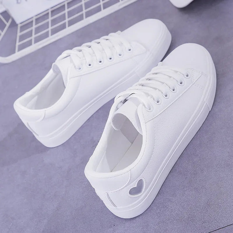 Women's PU leather heart pattern flat shoes in white red colour with non-slip rubber sole