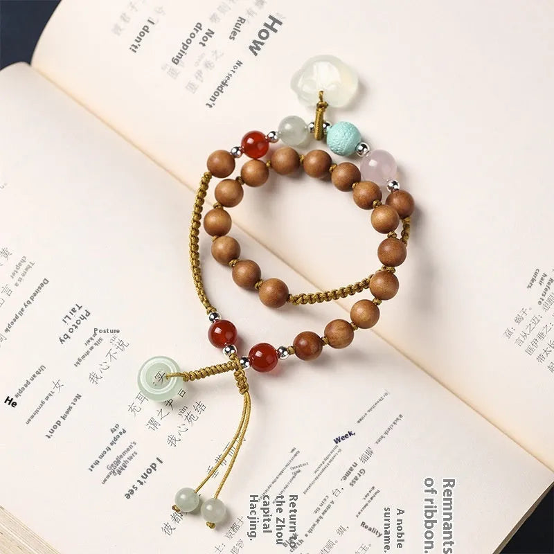 Hand-woven ebony wood bracelet with gemstone elements in double ring national style design