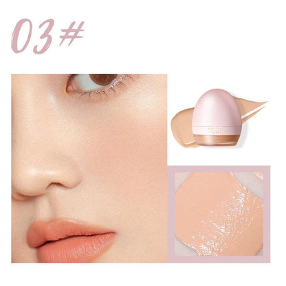 4-colour foundation cream compact with built-in sponge and small spoon applicator
