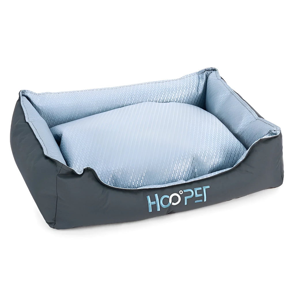 Soft grey dog bed with raised edges and a removable plush cover, shown in medium size.