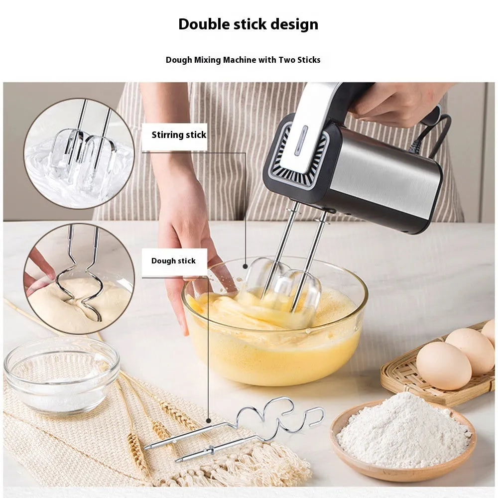 Silver mini electric handheld whisk with stainless steel beaters on a 5-speed control unit.