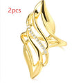 Women's exaggerated curve copper ring with zircon treatment in gold colour