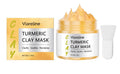 Yellow turmeric mud face mask in jar with applicator brush