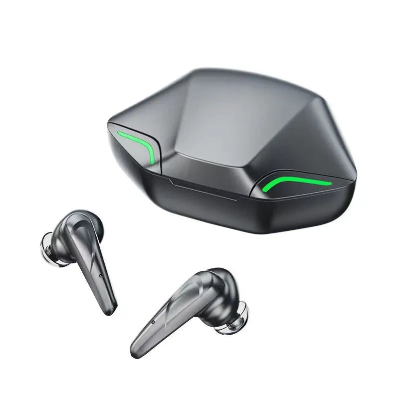 Wireless gaming earbuds with compact charging case in black, shown with interchangeable silicone ear caps.