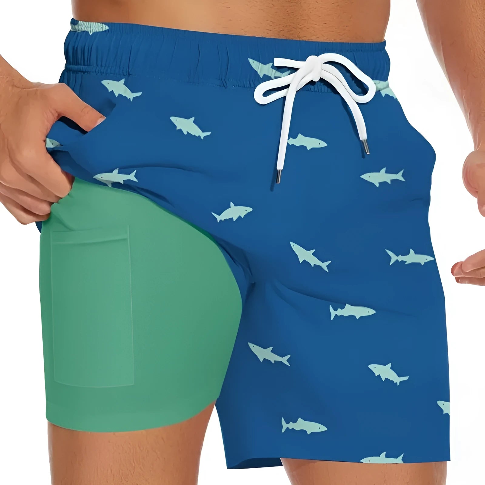 Men's black swim shorts with a printed shark design and white drawstring waist.