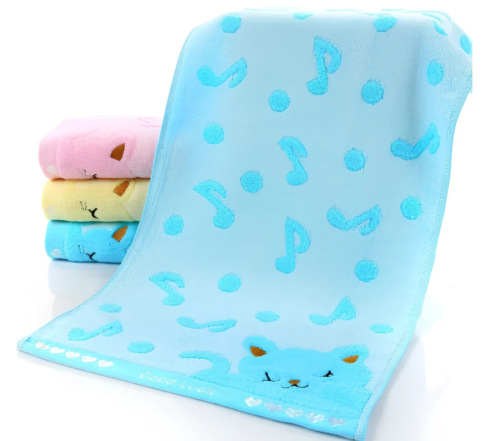 Bamboo fiber kitten face bath towel 25x50cm in blue with playful print
