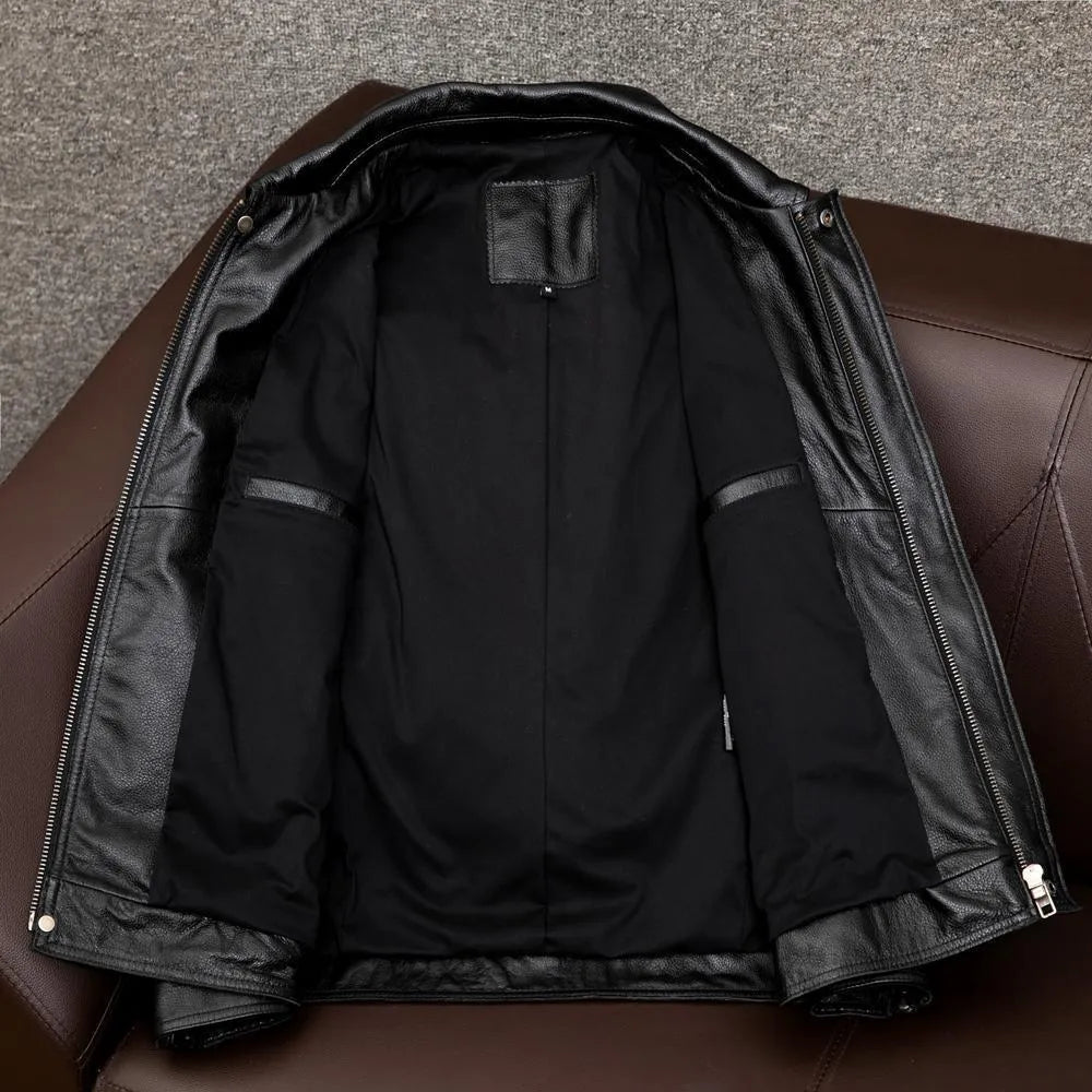 Men's plus size black retro lapel short leather jacket with side pockets on a model.