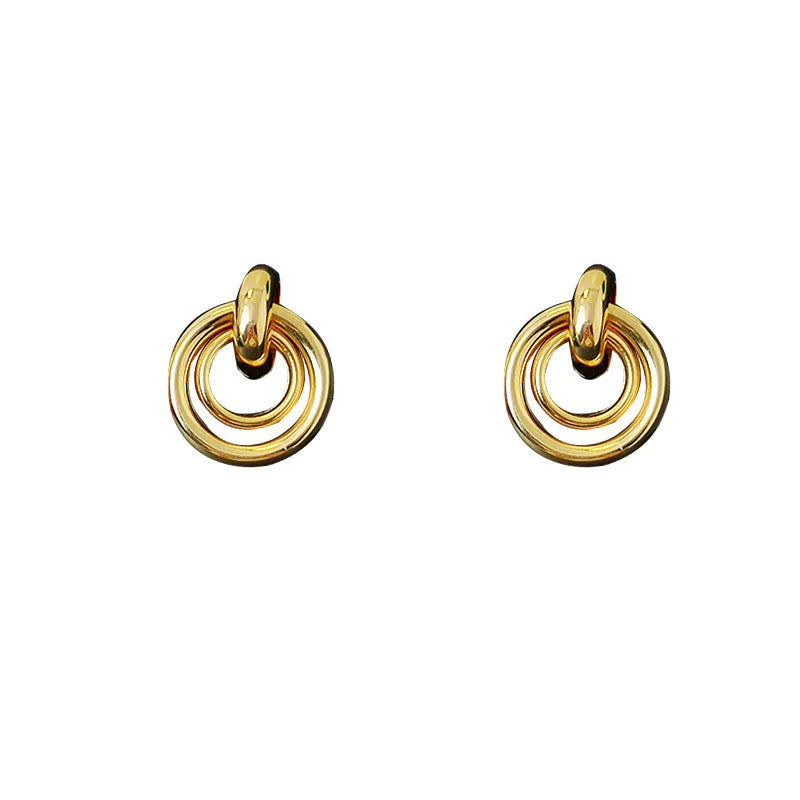 Geometric round ring earrings with irregular design in gold and silver colour options