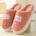 Letter design thick sole fluffy slippers in dark grey with plush upper and PVC sole for non-slip winter use