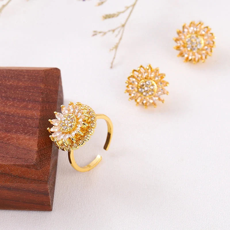 Sunflower-themed stainless steel jewellery set with zircon accents, including necklace, earrings, and ring