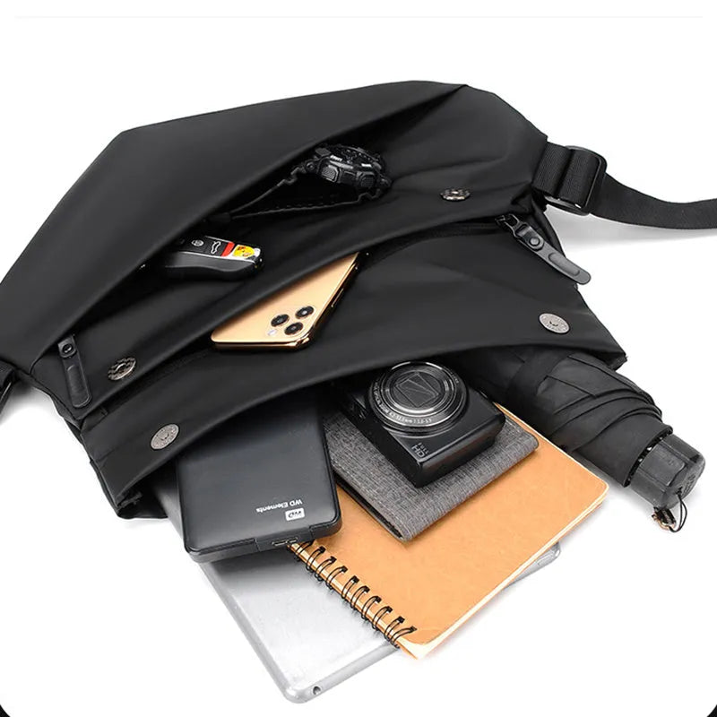 Grey and black men's medium PU crossbody bag with a zipper and internal organisers.