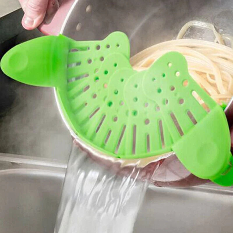 Universal Silicone Clip-on Pan Pot Strainer in purple and green, showcasing its compact design and secure clips