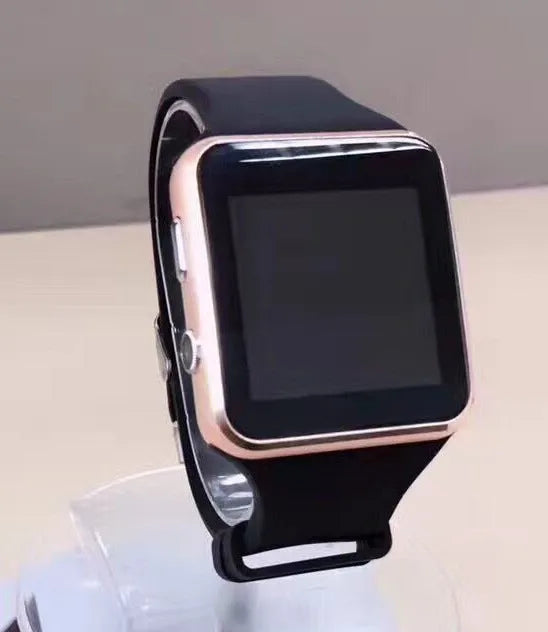 Black smart watch with 1.54 inch display and silicone strap on a wrist