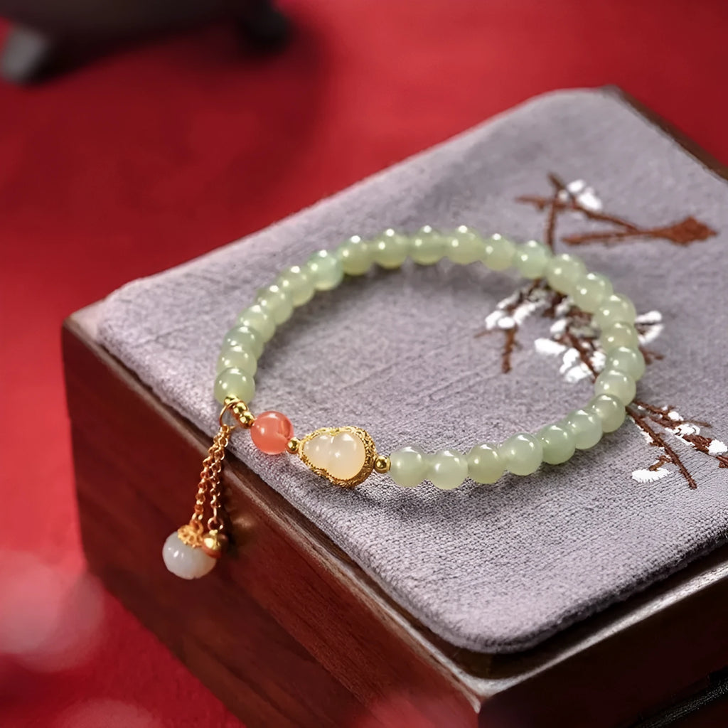 Jade women's bracelet with gold gourd sense design and fu character symbol, 6mm gold plated finish