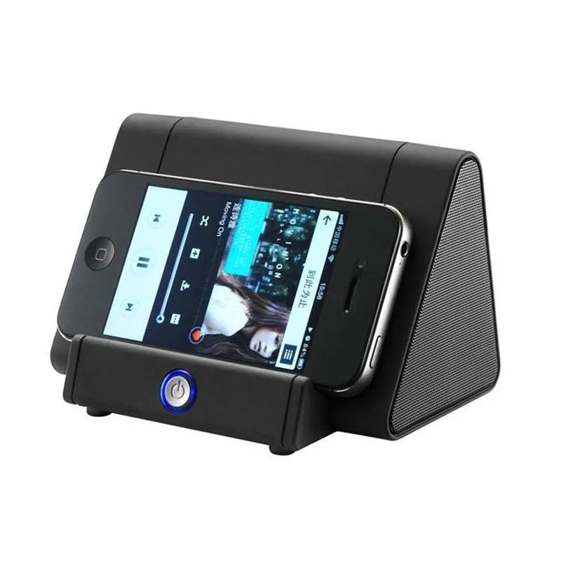 A small black or white wireless Bluetooth speaker for mobile phones and computers