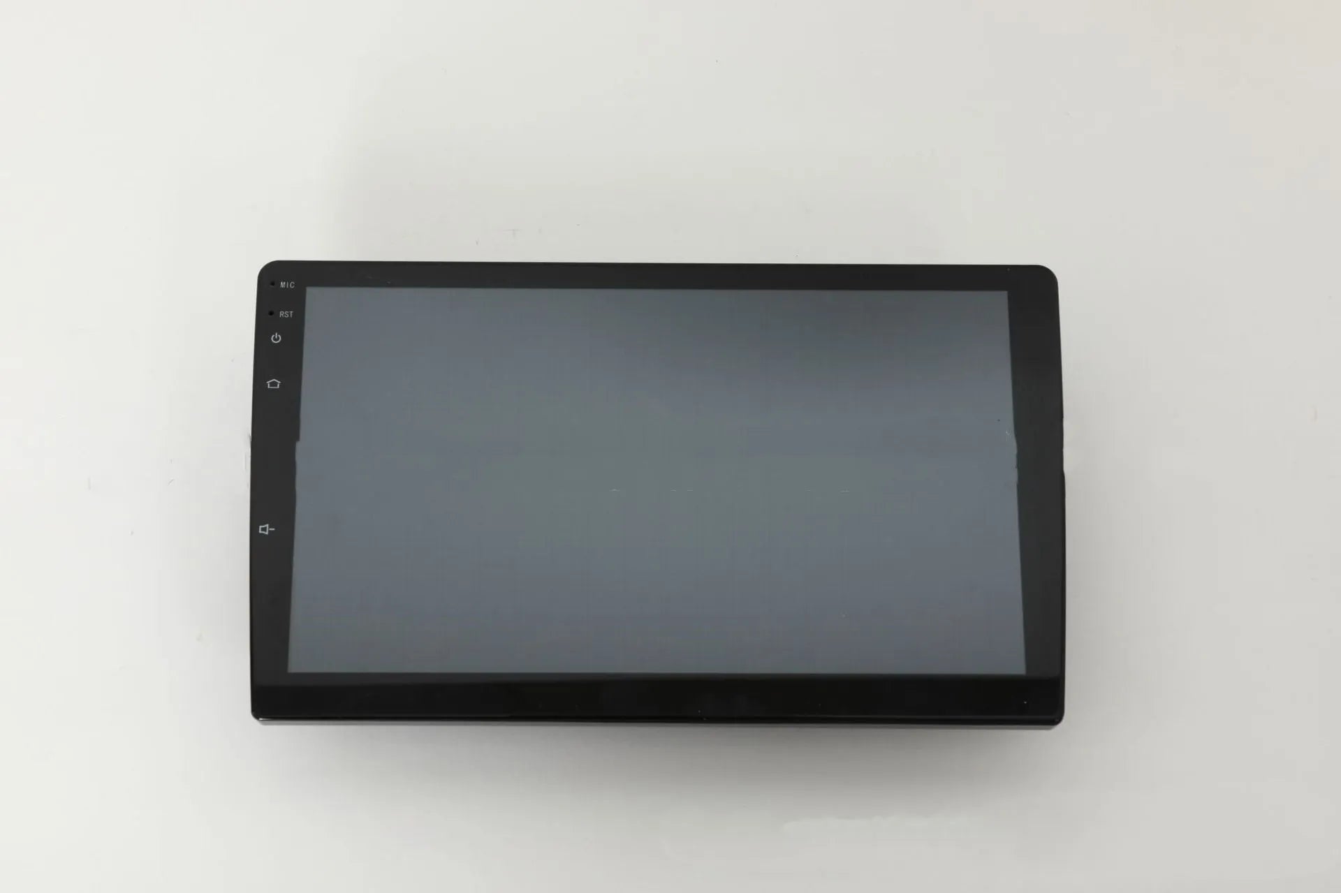Black universal 10.1 inch Android car stereo touchscreen head unit with trapezoid panel