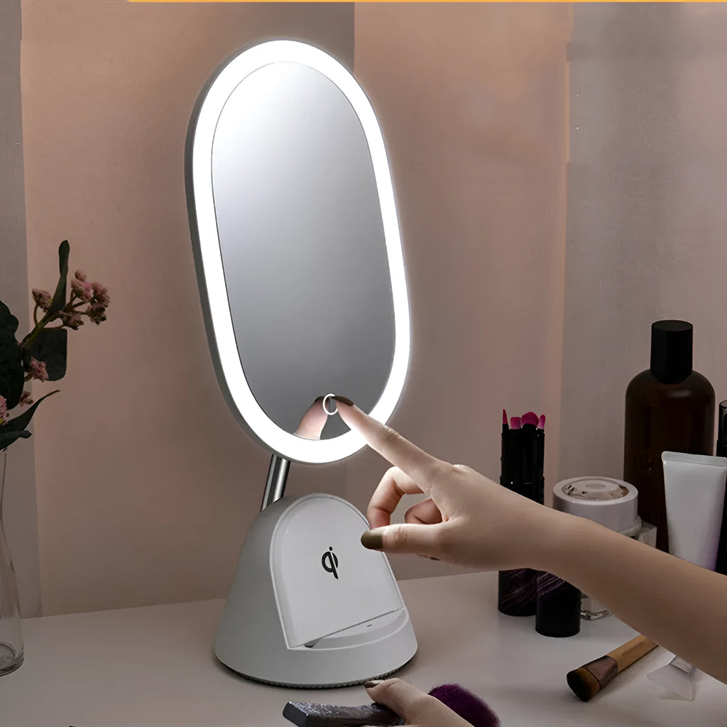 White and black desktop makeup mirror lamp on a table, showing mirror and light.