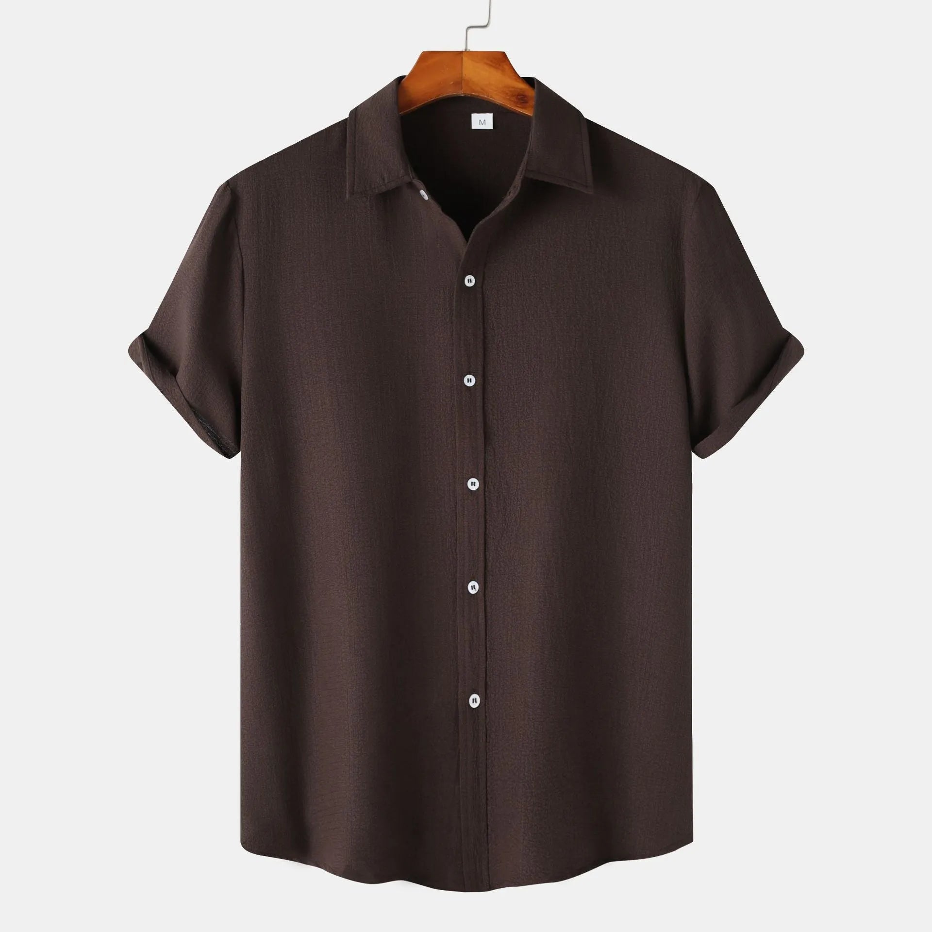 Man wearing a short-sleeved casual cardigan-style shirt in a GKESJ colour.