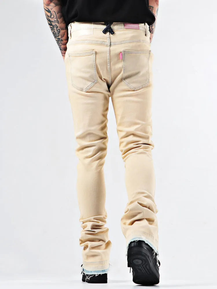 Stone washed medium high waist flare jeans in apricot cotton stretch denim with zipper fly