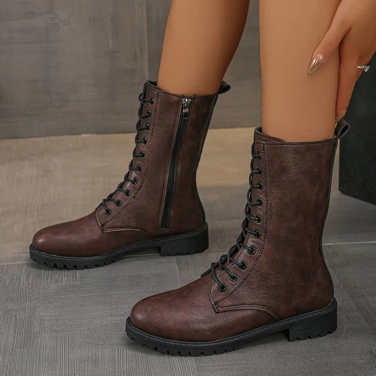Women's flat mid-calf lace-up boots in brown with artificial PU upper and hollow design detail