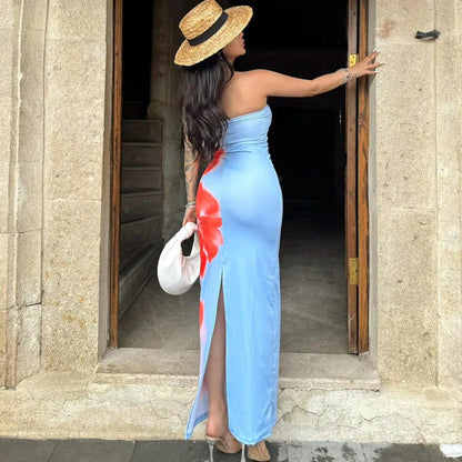 Chic slit maxi dress in various vibrant colors, featuring a high-waisted silhouette and flirty slit detail for a flattering and stylish summer look.