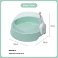 Round mint green cat litter box made from PP plastic on a wooden floor.