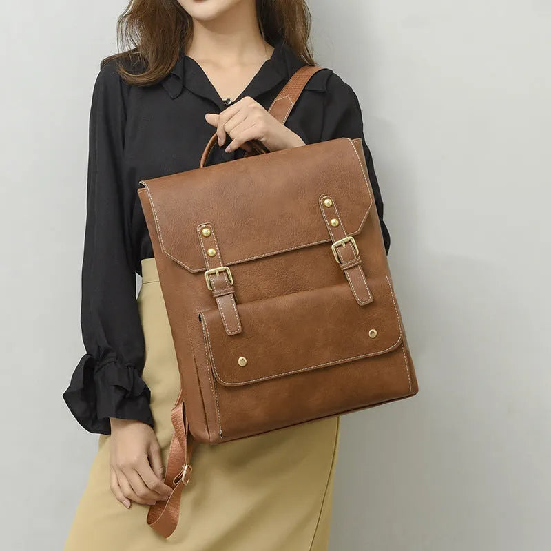 Korean style retro simple backpack in soft PU material, shown in dark brown colour