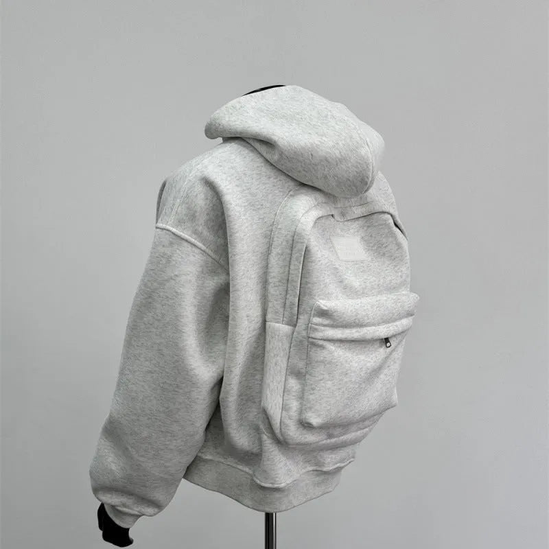 Men's grey hooded jacket with schoolbag-style back design showing front and back views