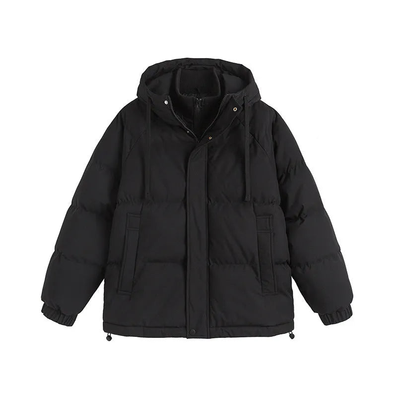 Loose beige winter cotton-padded coat with side pockets on a hanger