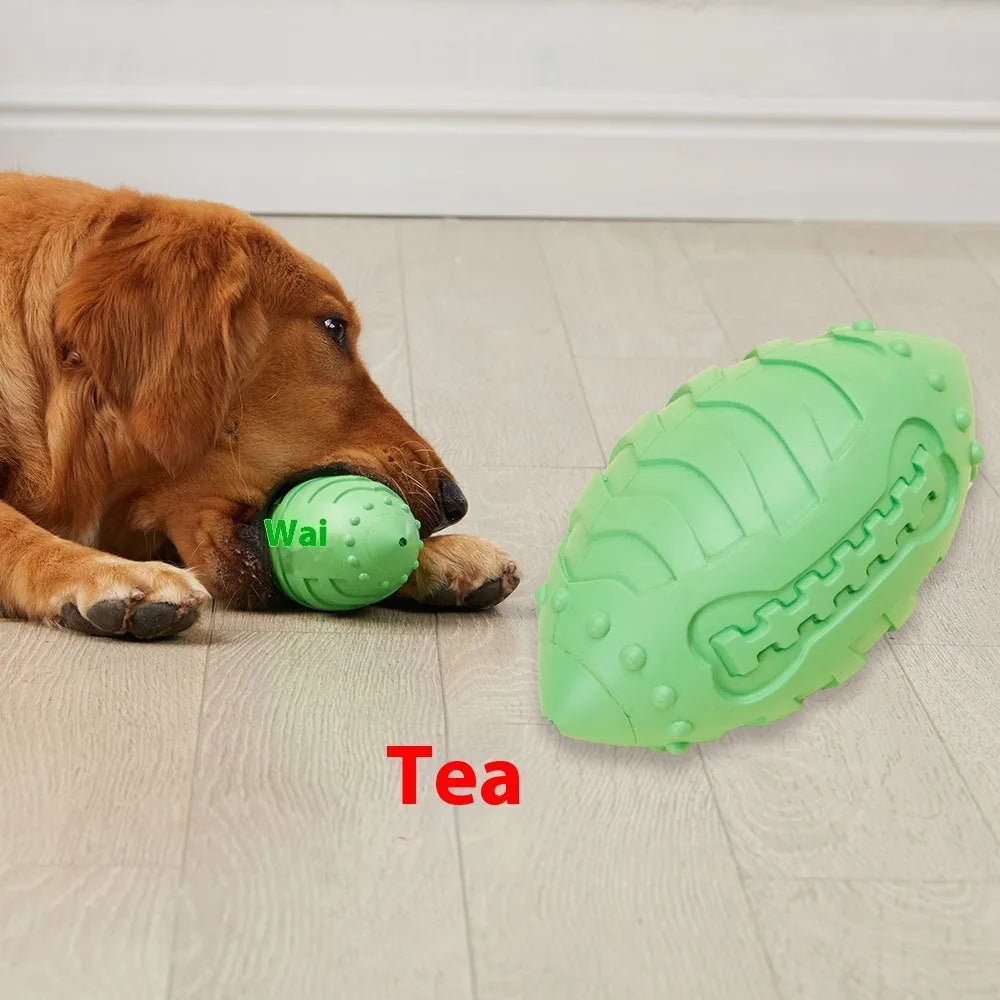 Thickened light green rubber rugby ball dog toy with vocal sound feature for chewing and interactive play.