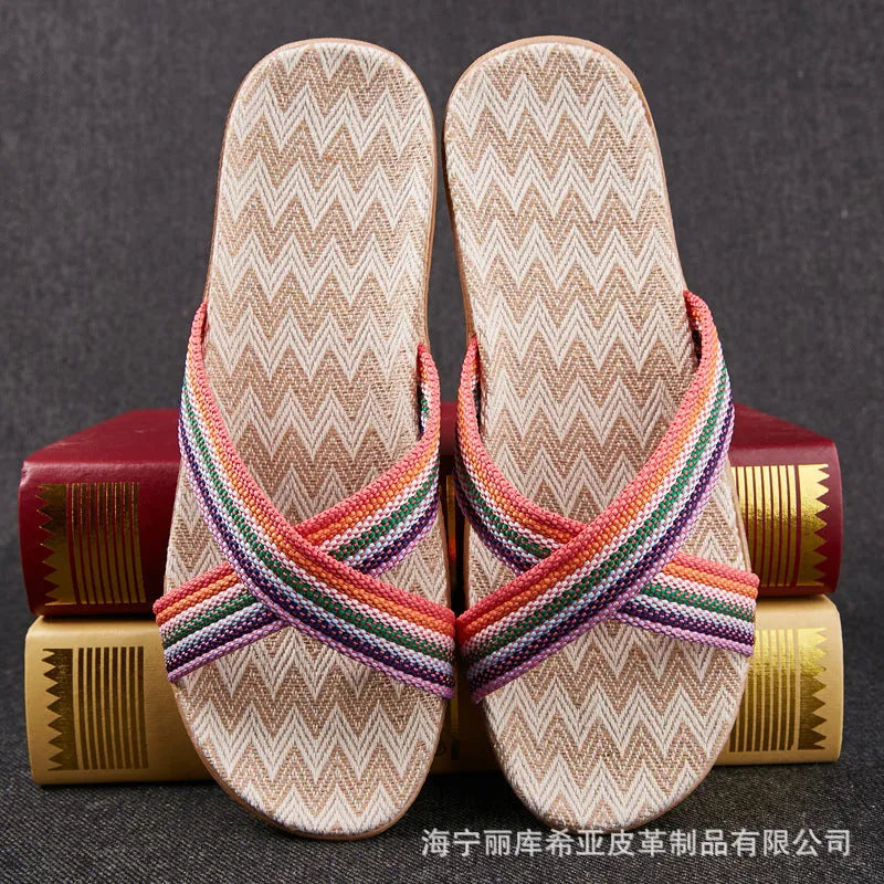 Linen open-toe home slippers with EVA sole in woven blue colour on a light background