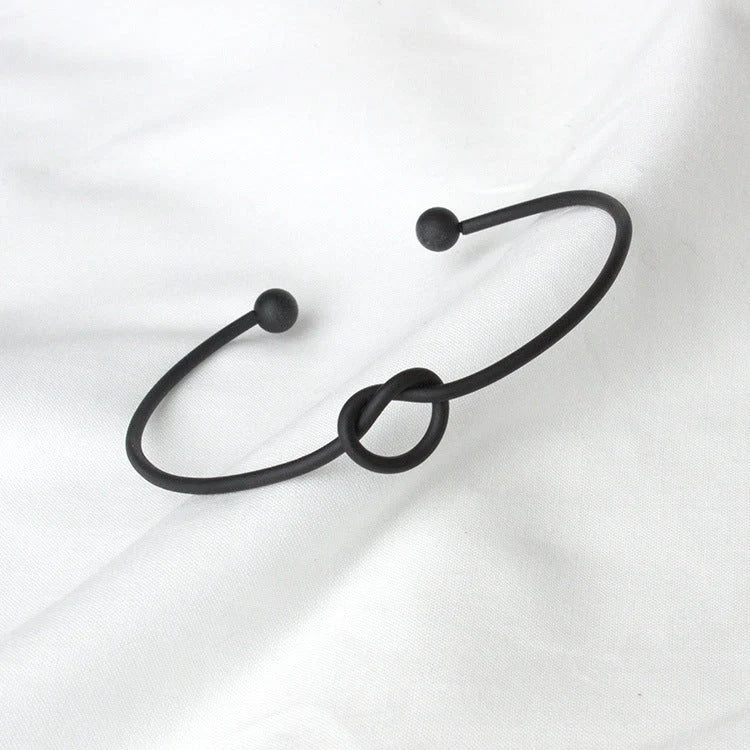 Knotted Knot O-Type Metal Openwork Bracelet in various colours, showcasing unique openwork design