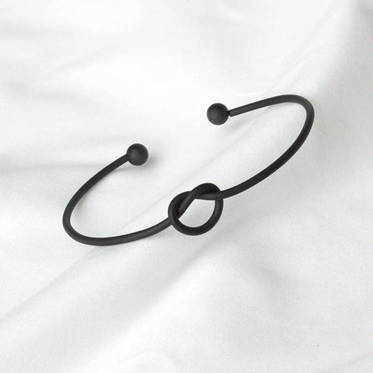 Knotted Knot O-Type Metal Openwork Bracelet in various colours, showcasing unique openwork design