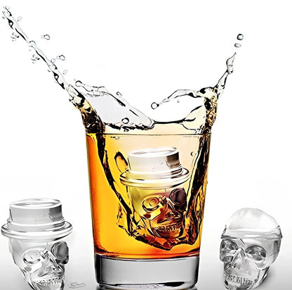 Black silicone ice cube tray with four skull-shaped cavities measuring 12cm long
