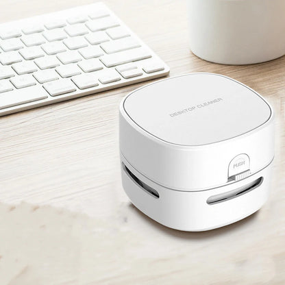 Compact 7.9cm wireless hand-held vacuum cleaner in multiple colours with AA battery operation