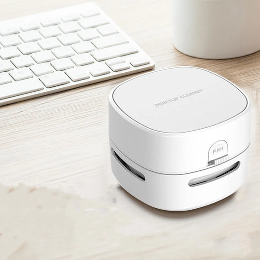 Compact 7.9cm wireless hand-held vacuum cleaner in multiple colours with AA battery operation