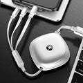 Black telescopic charging cable extended to full length showing three different connector types