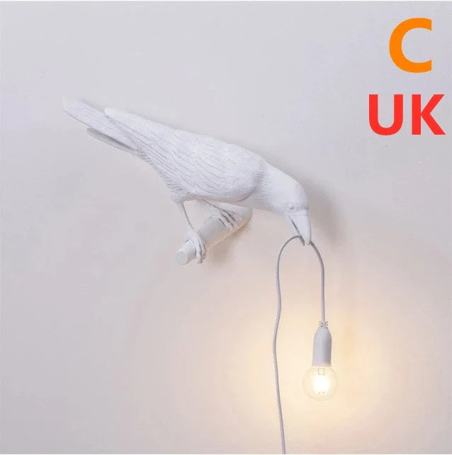 Auspicious Bird Resin Wall Lamp in white or black, featuring a unique bird design and G45 holder