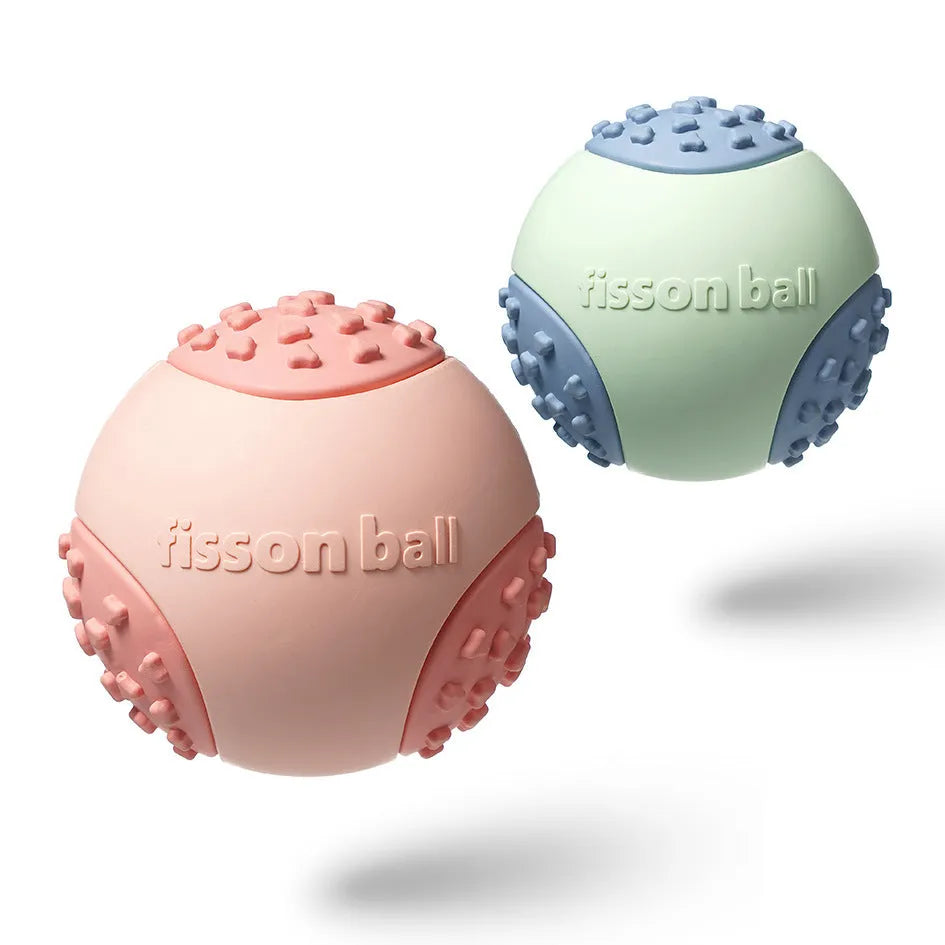 Green and pink rolling ball dog toy for small medium dogs measuring 64mm diameter