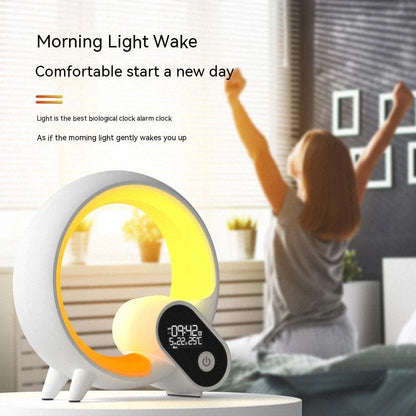 Sunrise-simulating alarm clock with Bluetooth connectivity, soothing white noise, and customizable RGB lighting for a relaxing sleep and wake-up experience