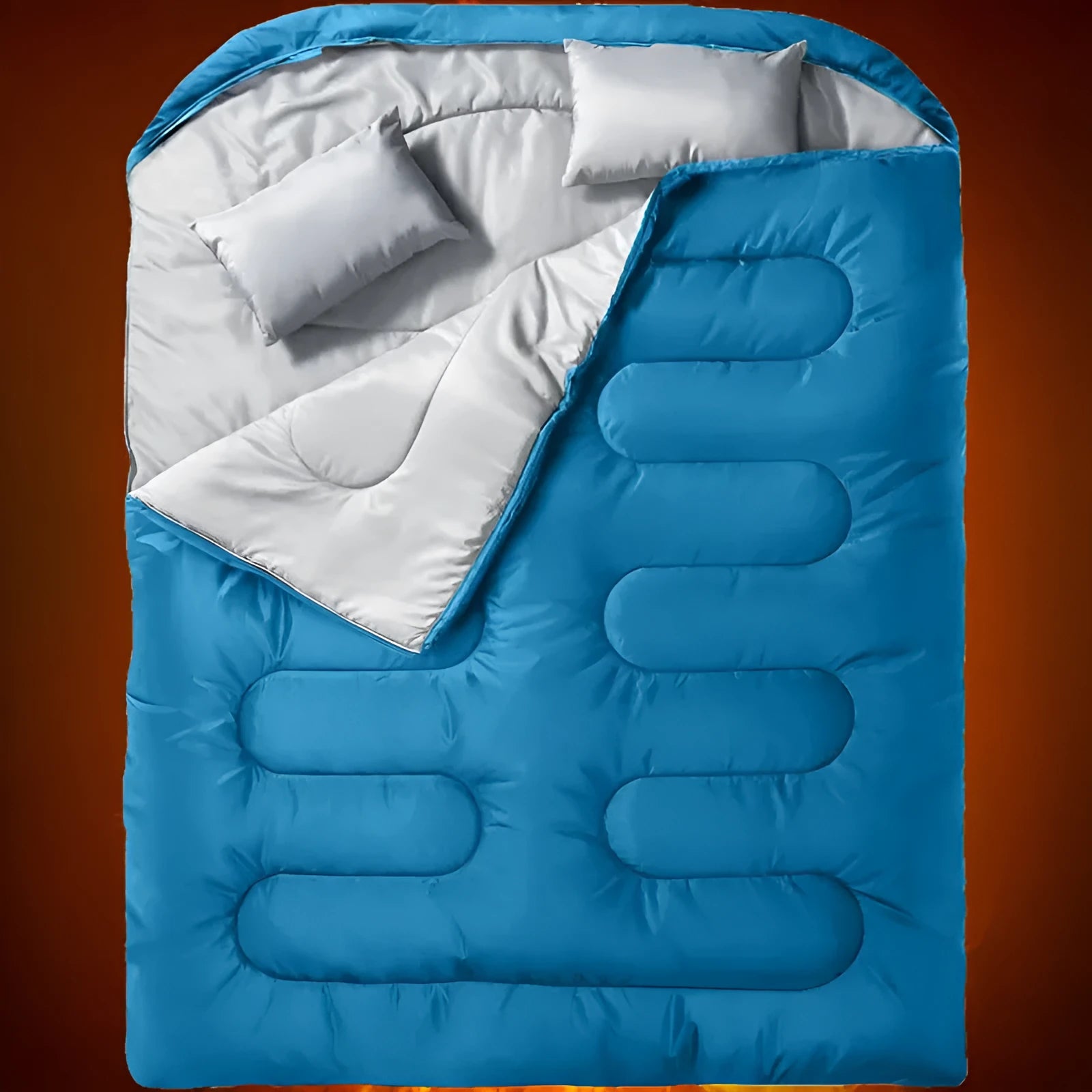 Seven-in-one pillow size sleeping bag in black double, folded to compact cushion shape on outdoor ground