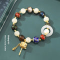 Hand-woven bracelet with fragrant grey coloured glaze, sunstone beads and white lip shell beads
