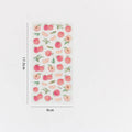 Roll of DIY fruit bronzing stickers showing grape, orange, passion fruit, peach, pineapple, and strawberry designs