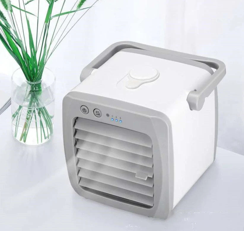 Mini mobile air conditioner electric fan in white with USB portability